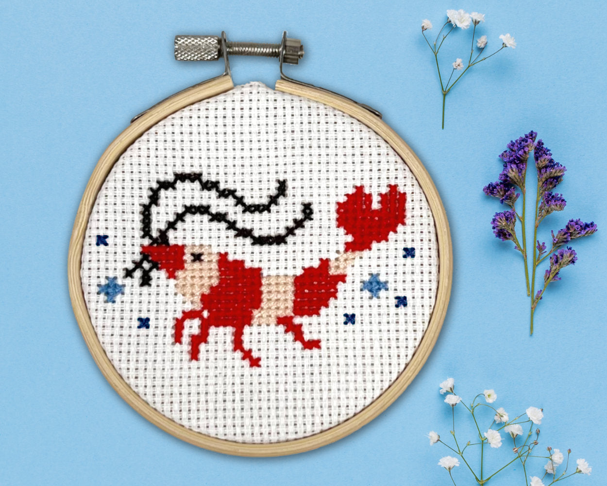 Garnele Kreuzstich blauer Hintergrund