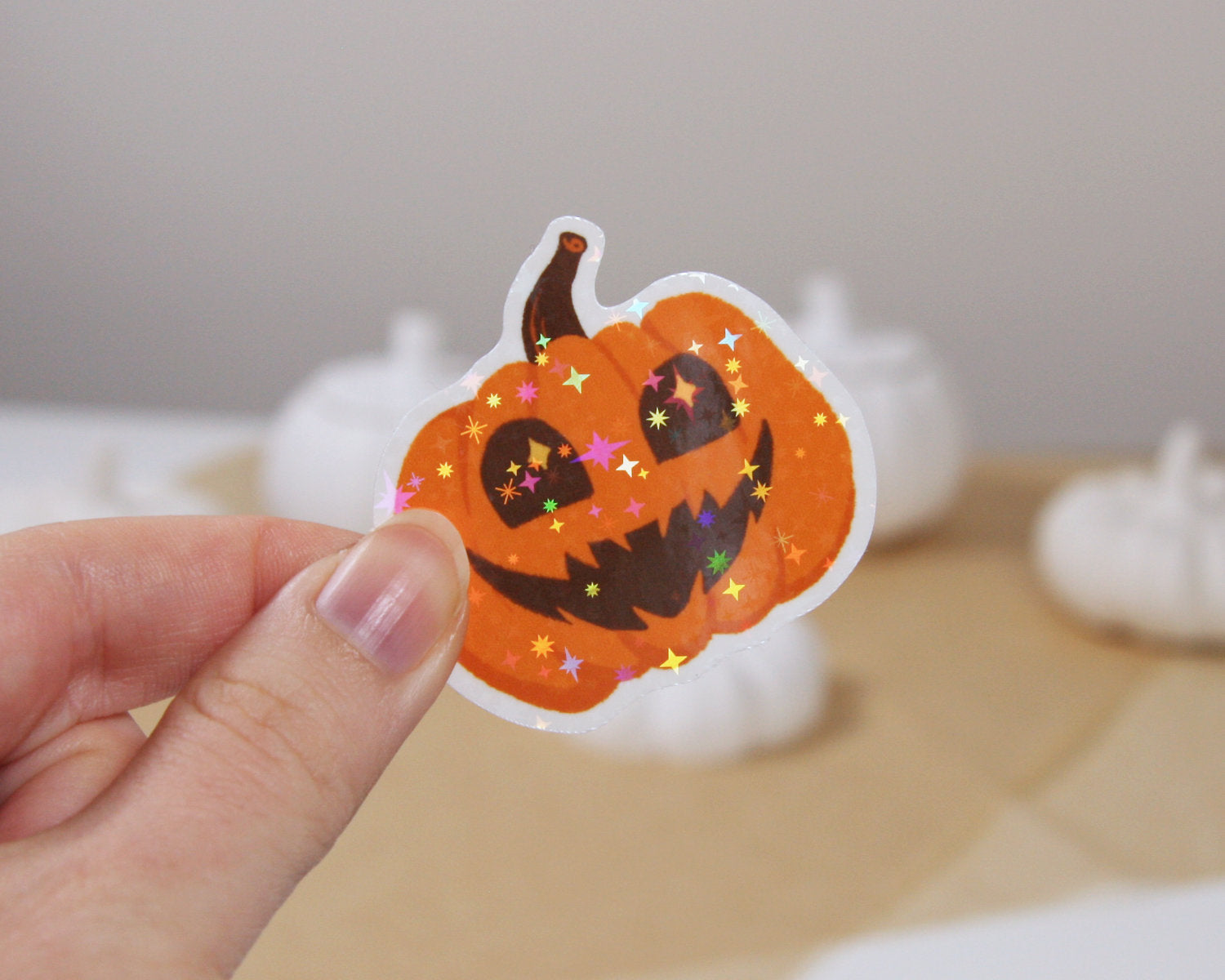Grinsender Kürbis Sticker – Holografischer Halloween-Sticker aus Vinyl